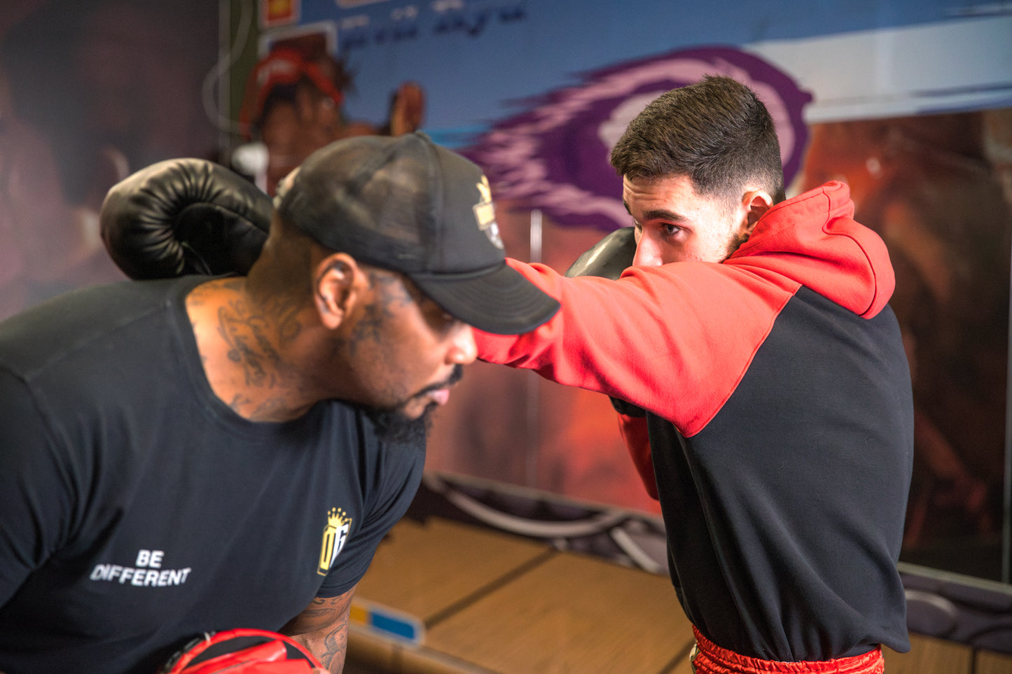 A photo of a Boxer demonstrating missing a punch whilst training