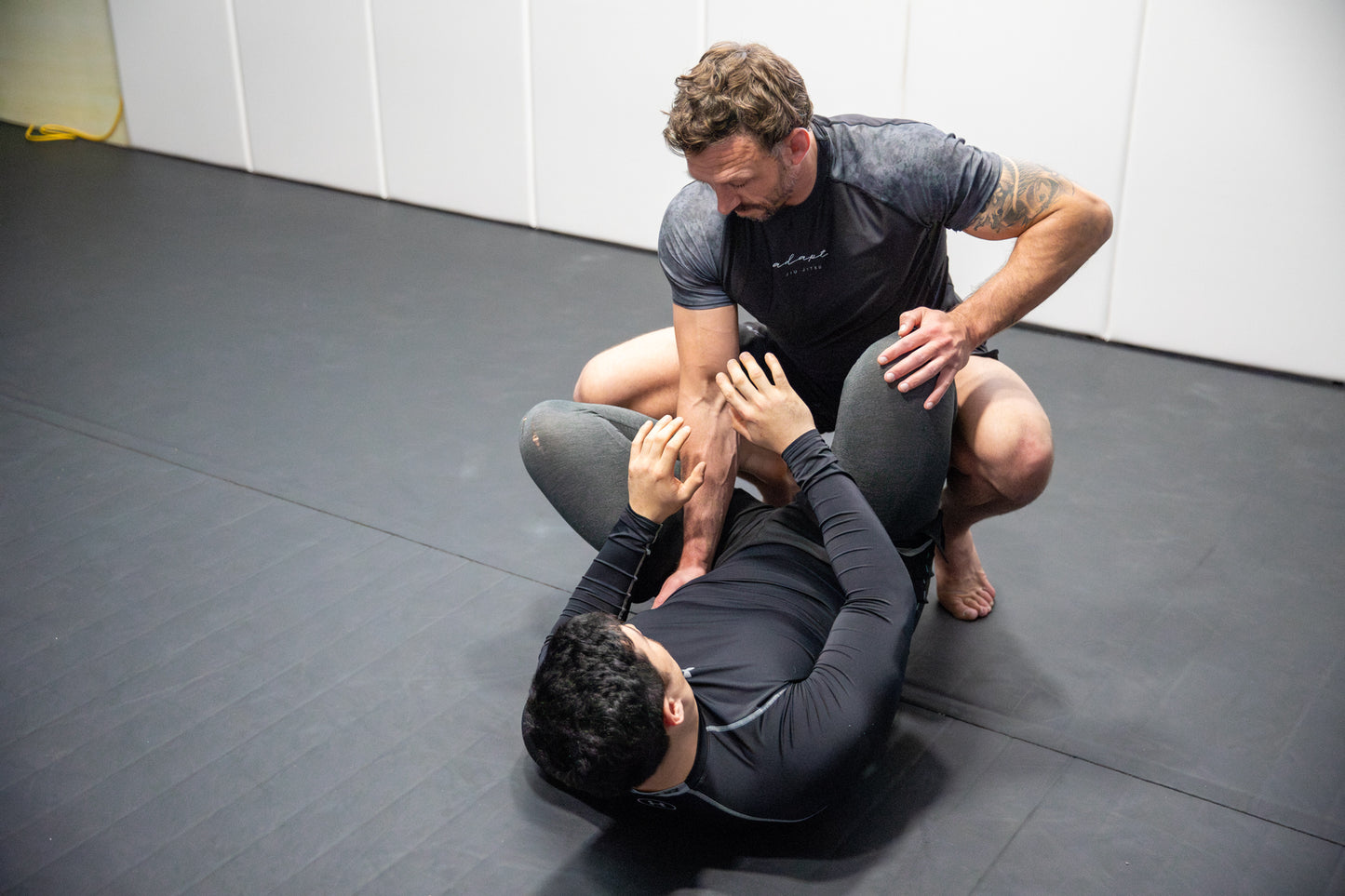 A photo of an athlete training in Brazilian Jiu Jitsu