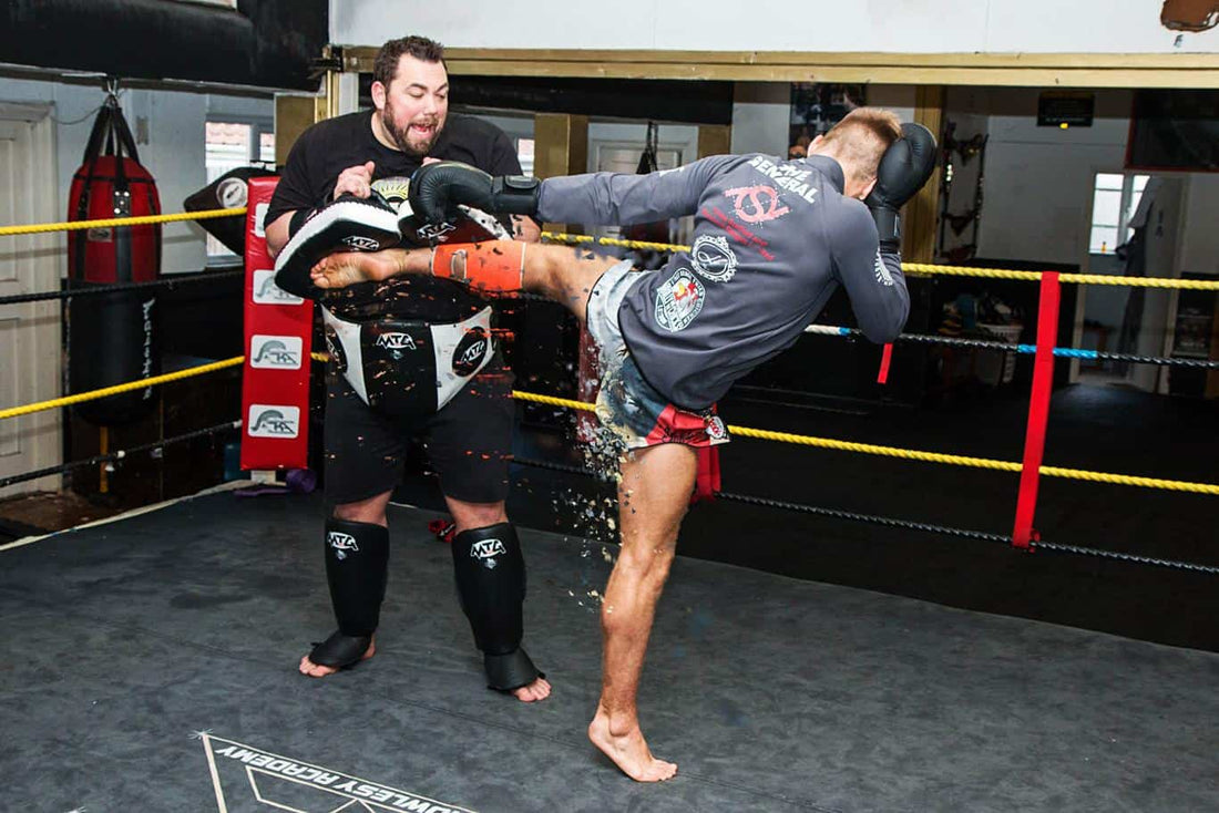 Muay Thai Fighting - Faking to land Power Kicks at Elite Level