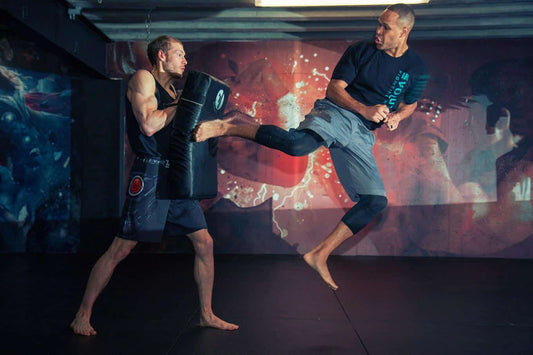Raymond Daniels – How to set up and land spin back kicks in kickboxing and MMA