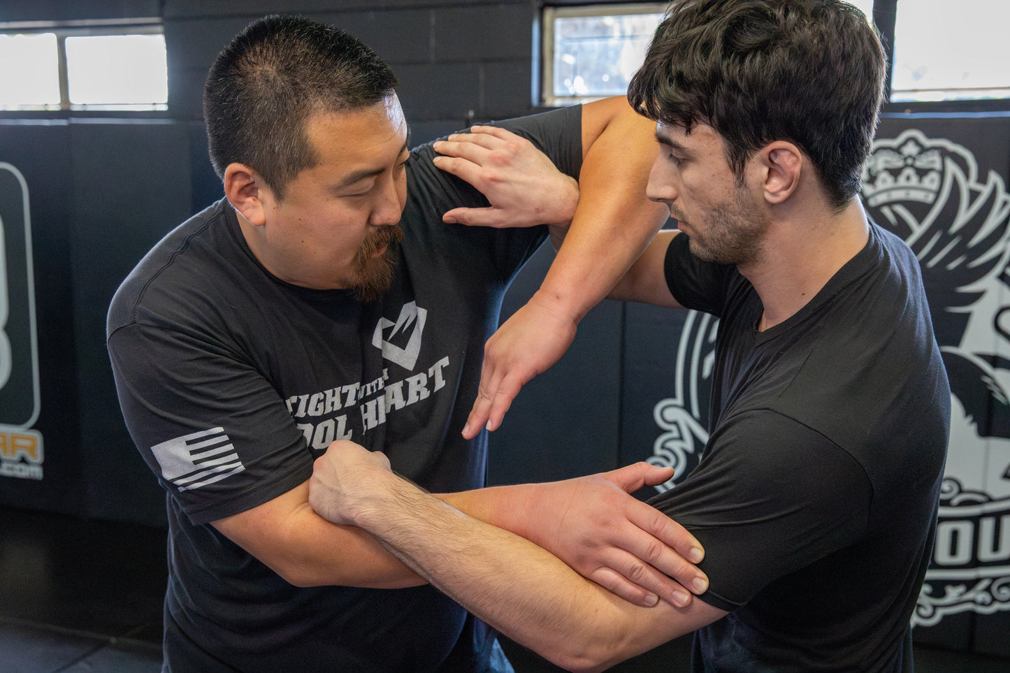 This is a photo of Jason Park demonstrating clinch in Muay Thai