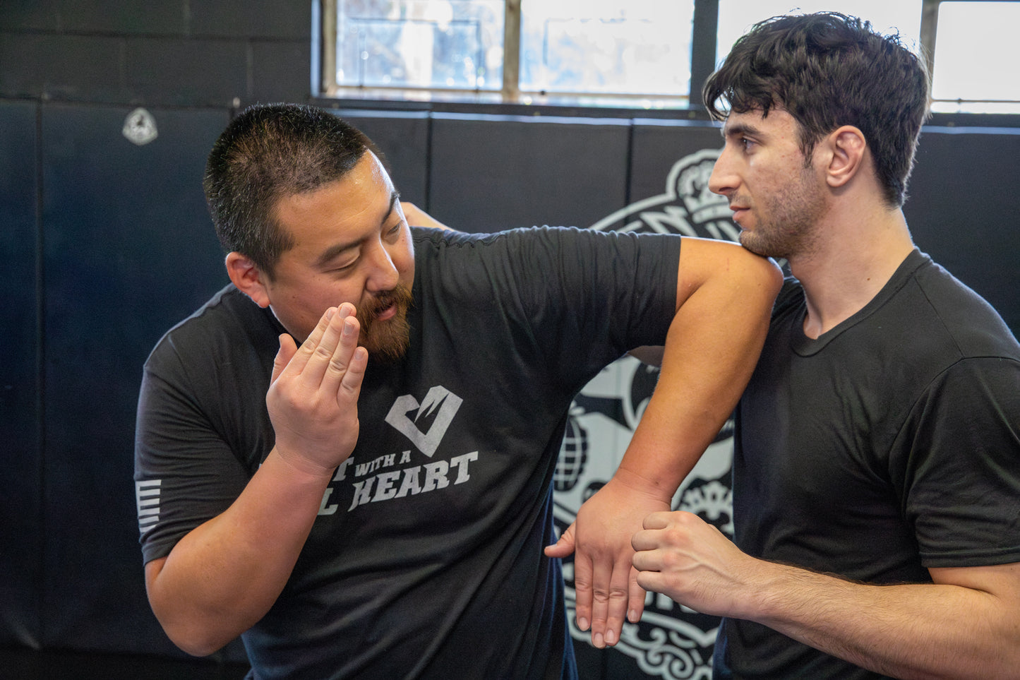 This is a photo of Jason Park demonstrating an elbow in Muay Thai