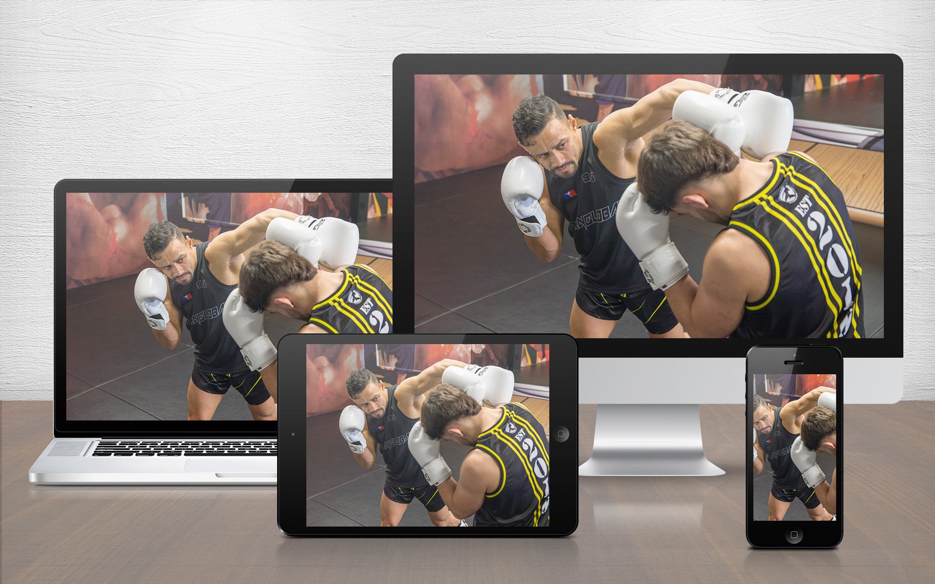 A photo of two fighters demonstrating Muay Thai techniques