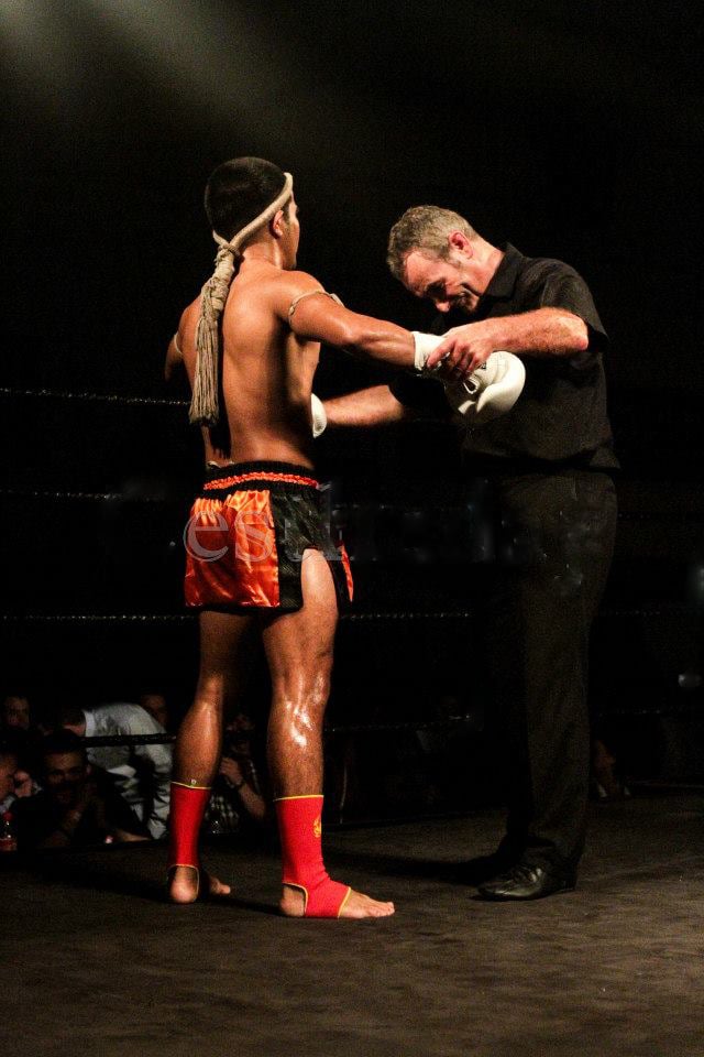 A photo of a Muay Thai Referee in action