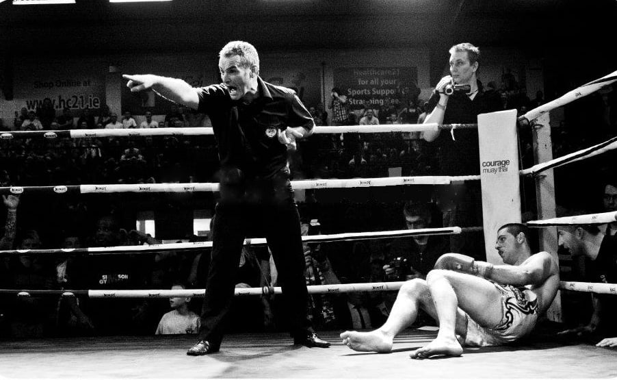 A photo of a Muay Thai Referee in action