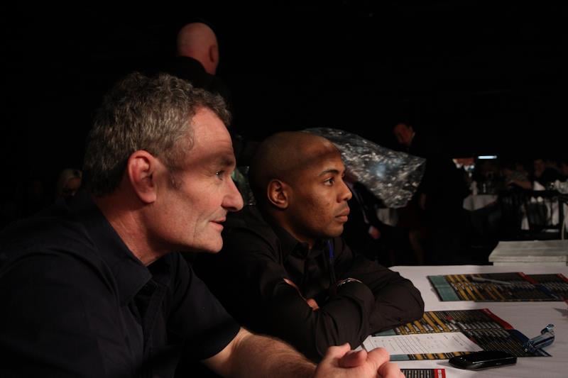 A photo of a Muay Thai judge in action