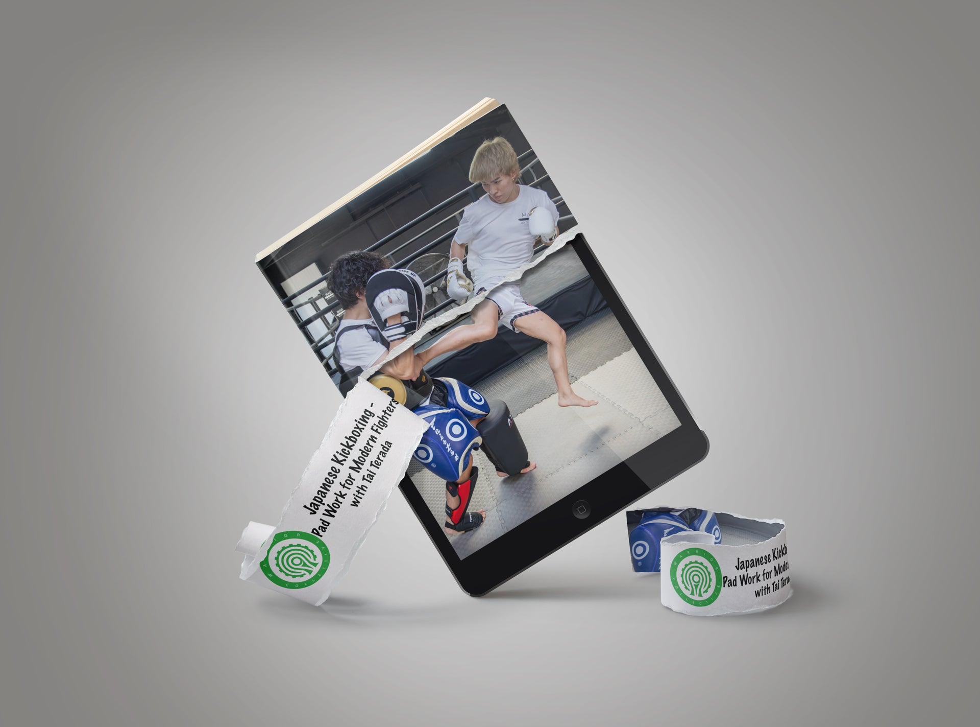 A tablet device displaying a martial arts photo taken in a gym